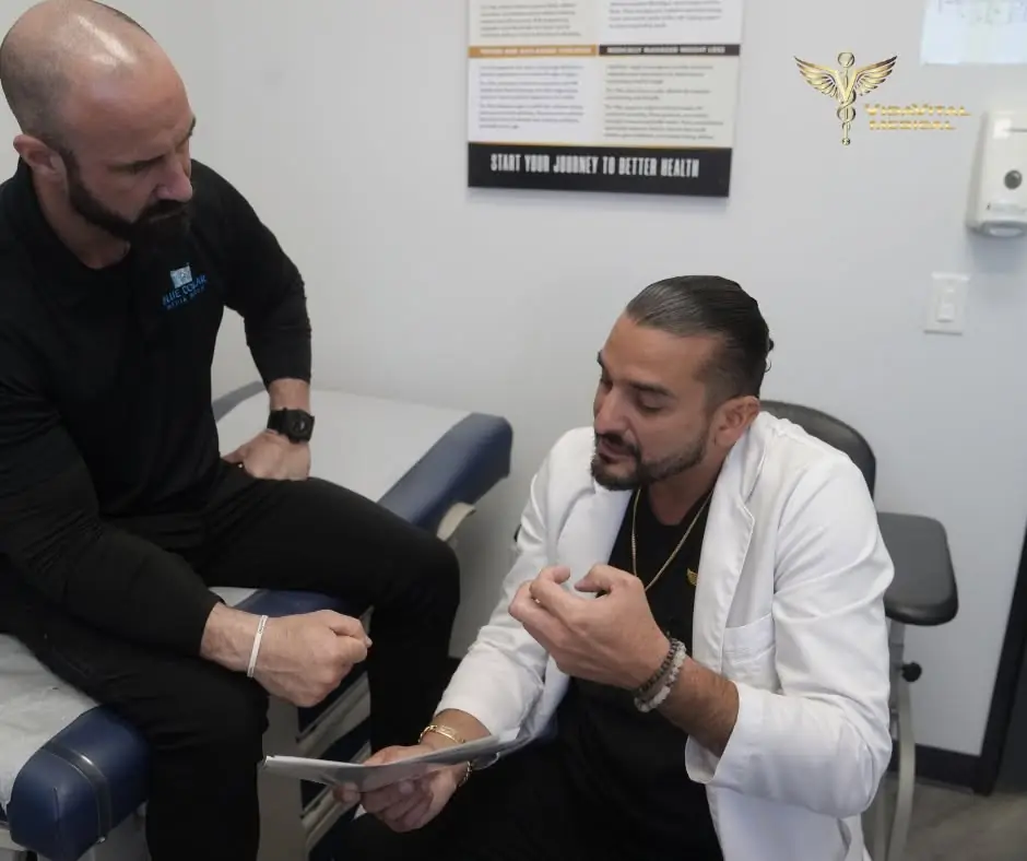 VidaVital Medical provider in a white coat consulting with a patient