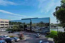 Glass office building that houses the VidaVital Medical Omaha office